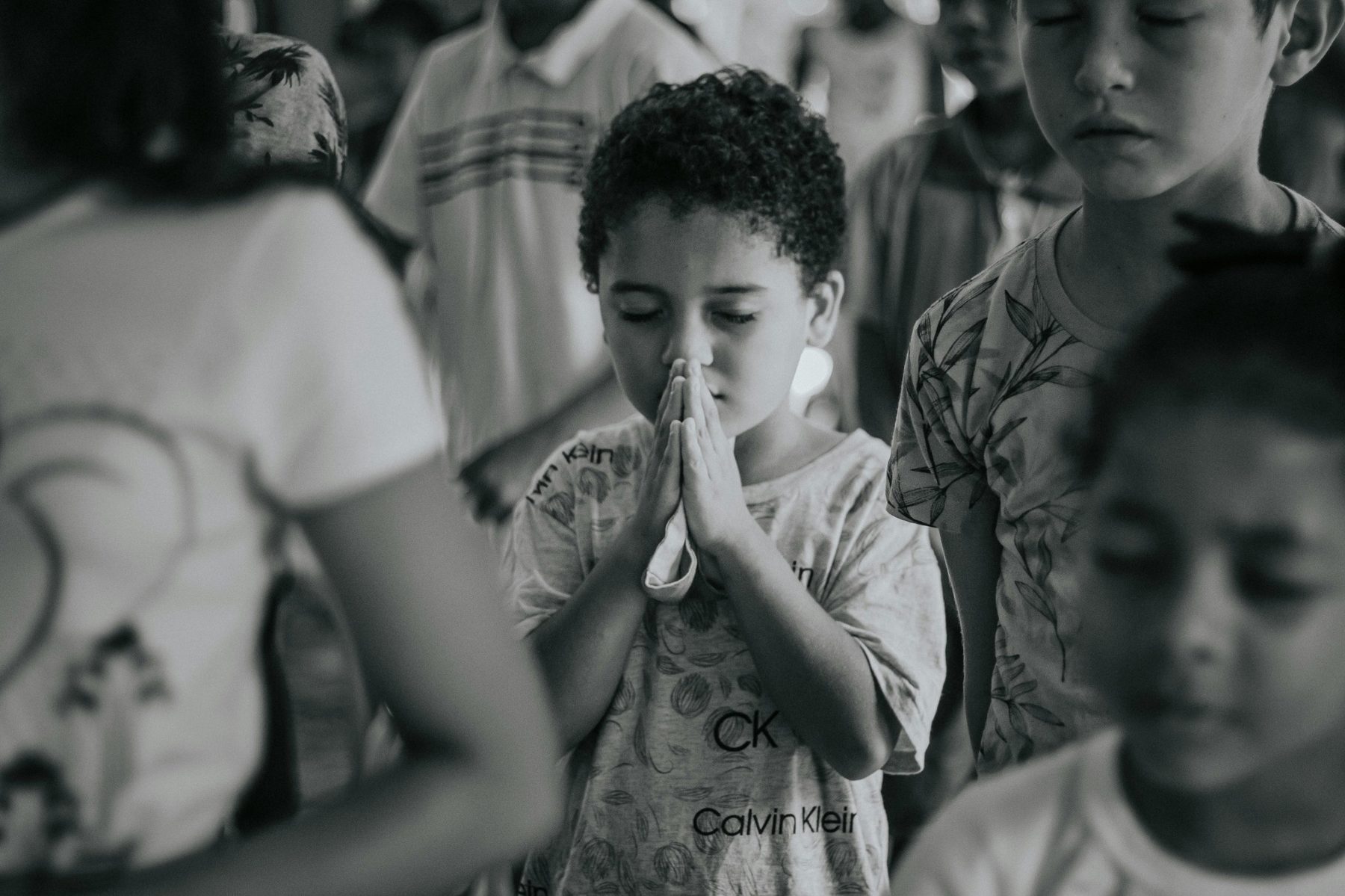 Children gathered in prayer